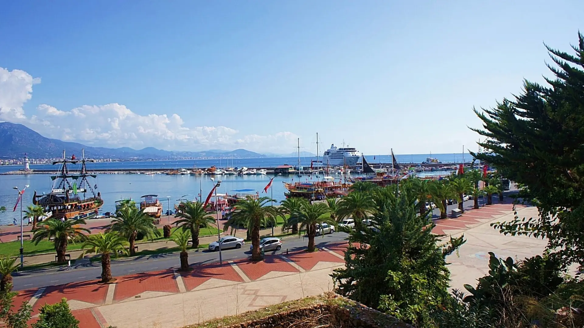 The palm-lined seafront promenade and port at Alanya
